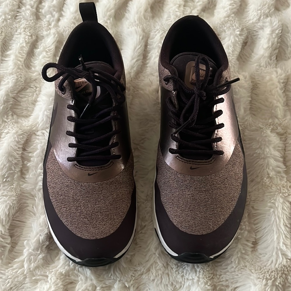 Nike shoes, a couple time of use, new condition, gold rose color, brown